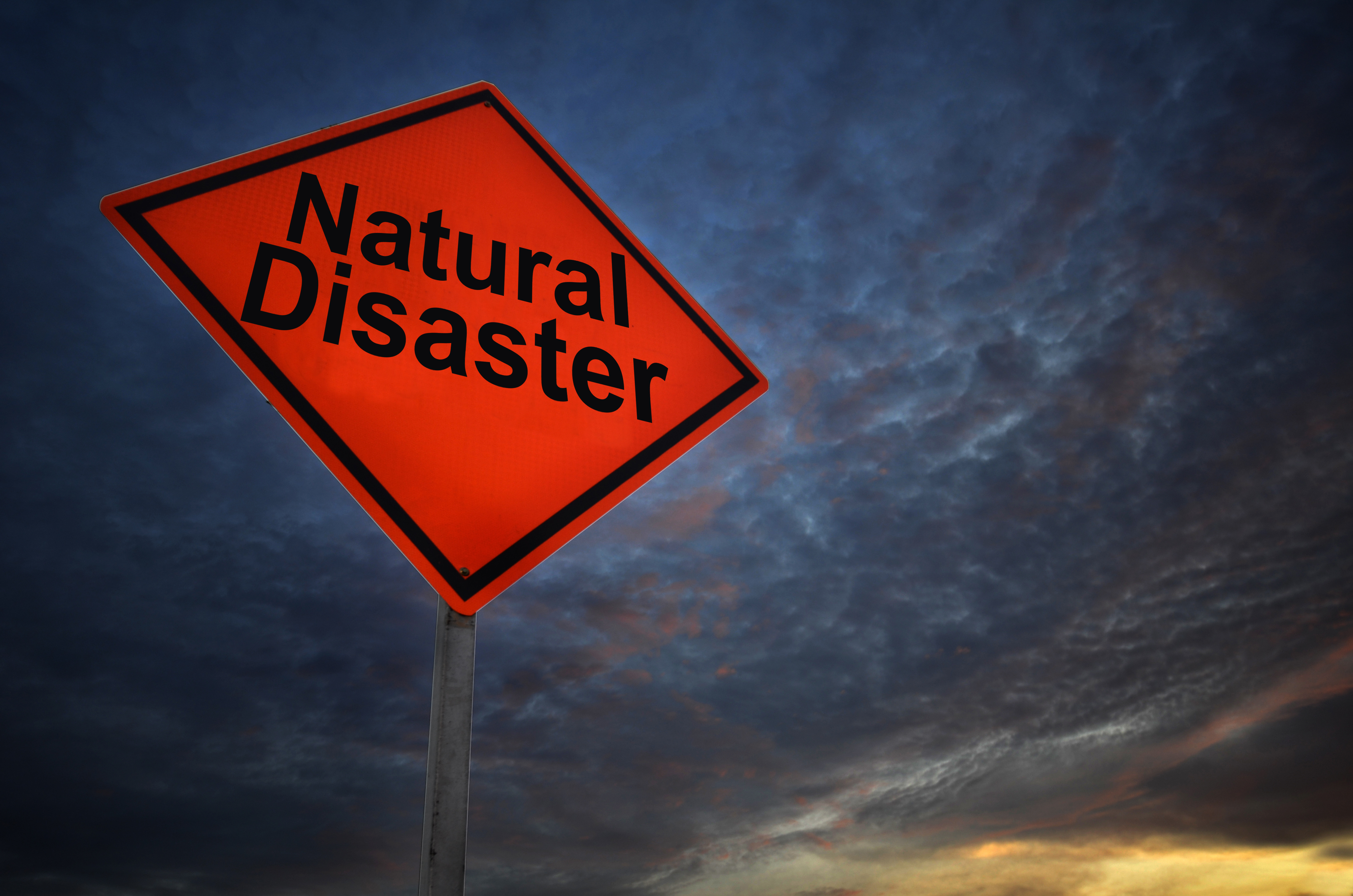 Caution Sign with Natural Disaster