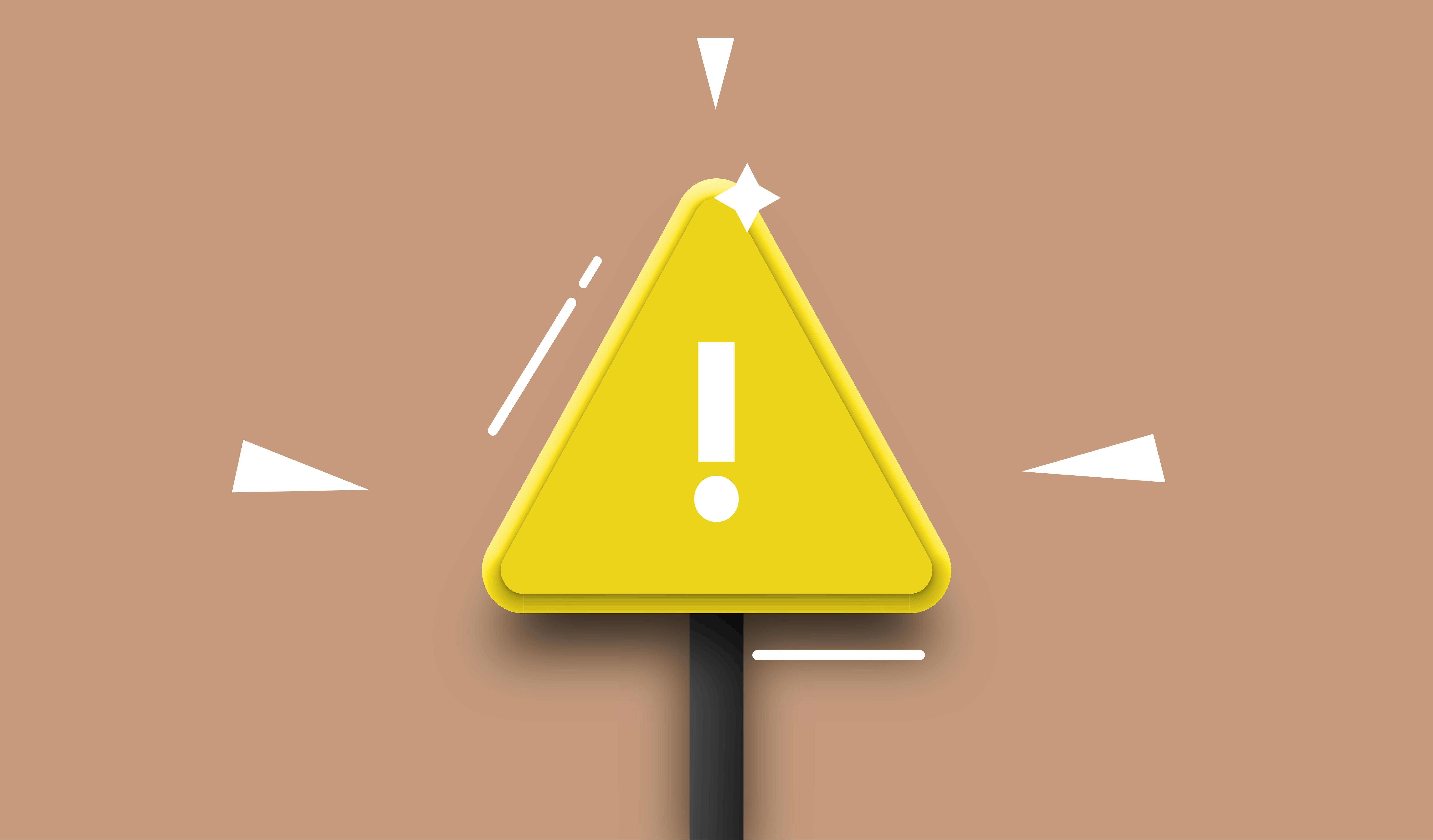 A yellow triangle sign with a white exclamation mark