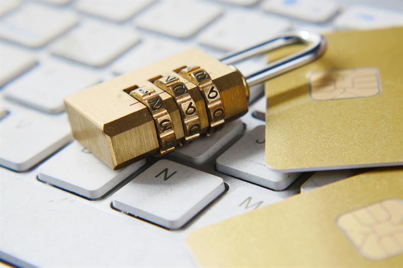 Identity Theft A lock on a Keyboard
